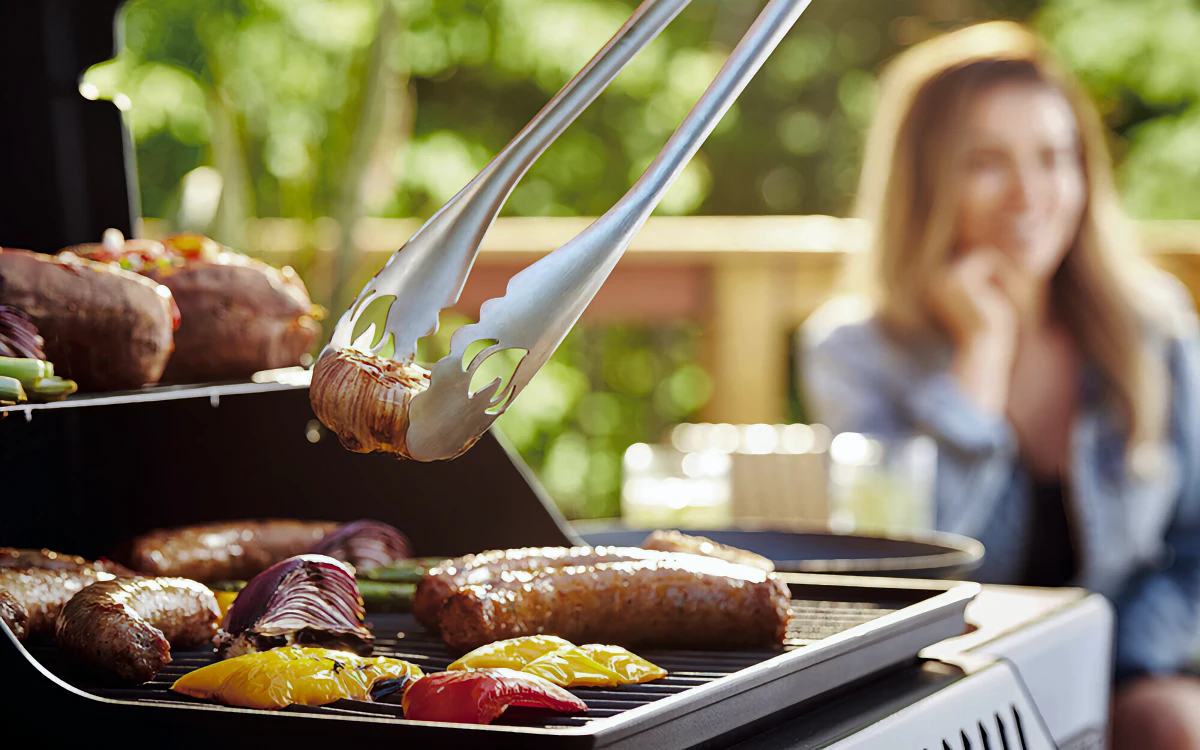 grilling in an outdoor kitchen